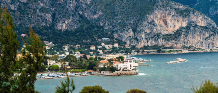 Corfu seaside village with cliffs and blue sea
