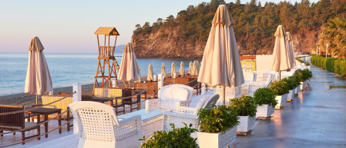 Paros beachfront resort with umbrellas and sea view